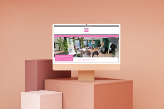 Coral iMac standing on the box in a minimalistic scene_9AqDlDKaEe2DjAJCrBEABg
